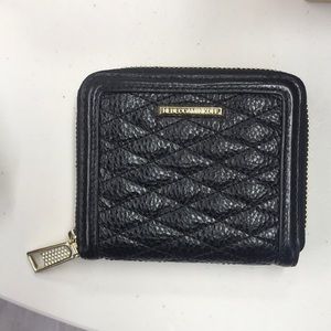 Rebecca Minkoff black quilted wallet with gold zipper. Like new. Never used